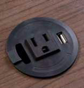 Power Center Fits 2.25" Grommet hole. Features 1 power outlet and 1 USB connection with optional data or charge. 5' power cord, 40" USB cable. Stocked in Black.